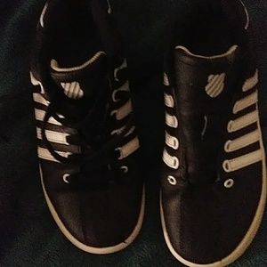 Boys Adidas tennis shoes.